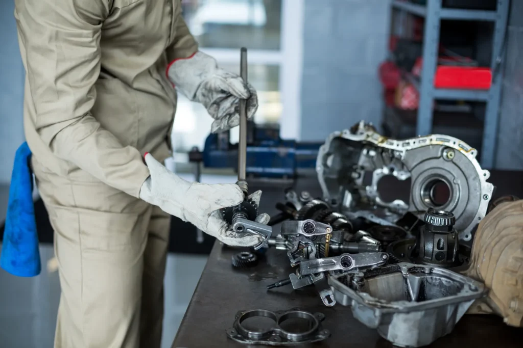 Technician inspecting an opened transmission on a shop bench during transmission diagnostics in Woodbridge