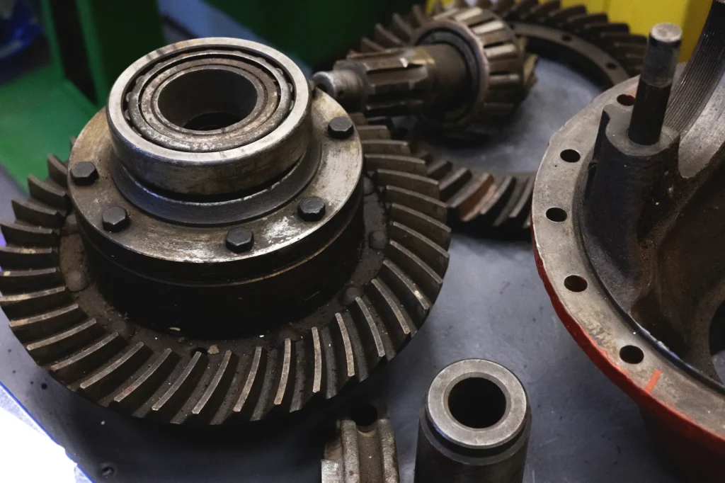 Differential ring gear and parts laid out for differential repair