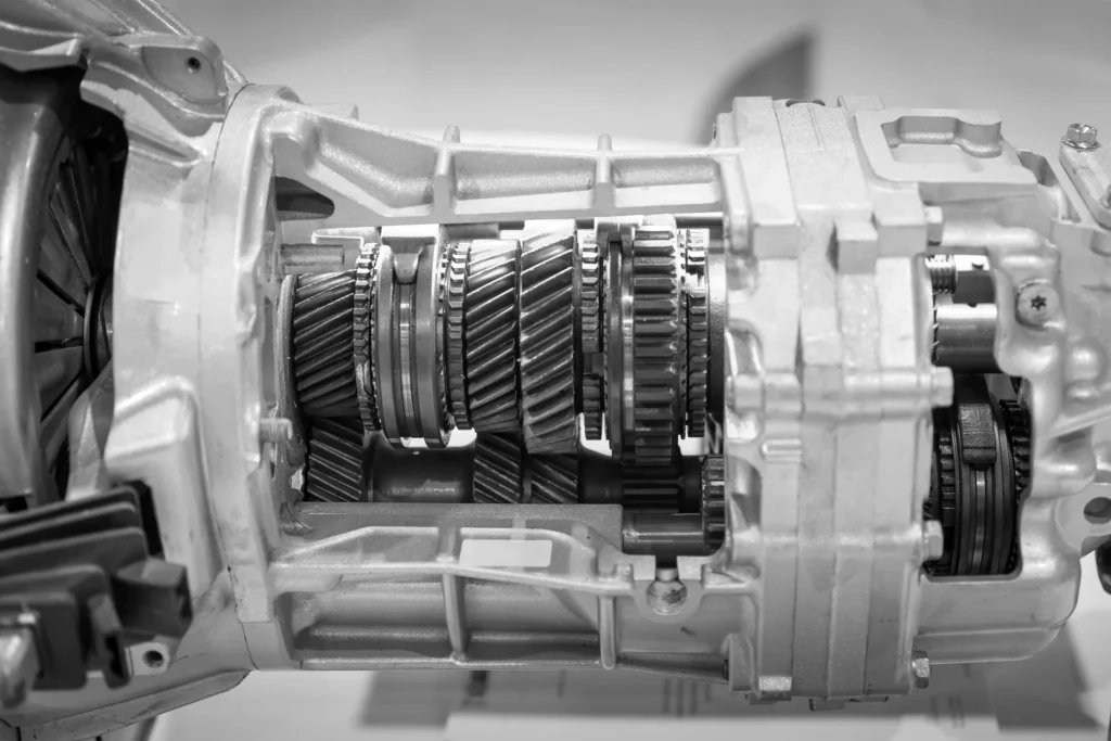 Cutaway of a manual gearbox showing gears and shafts